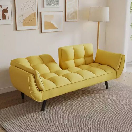 Divano letto giallo da 57" con schienale regolabile, borchie decorative e cuscino decorativo