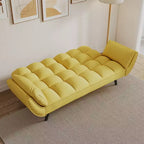 Divano letto giallo da 57" con schienale regolabile, borchie decorative e cuscino decorativo